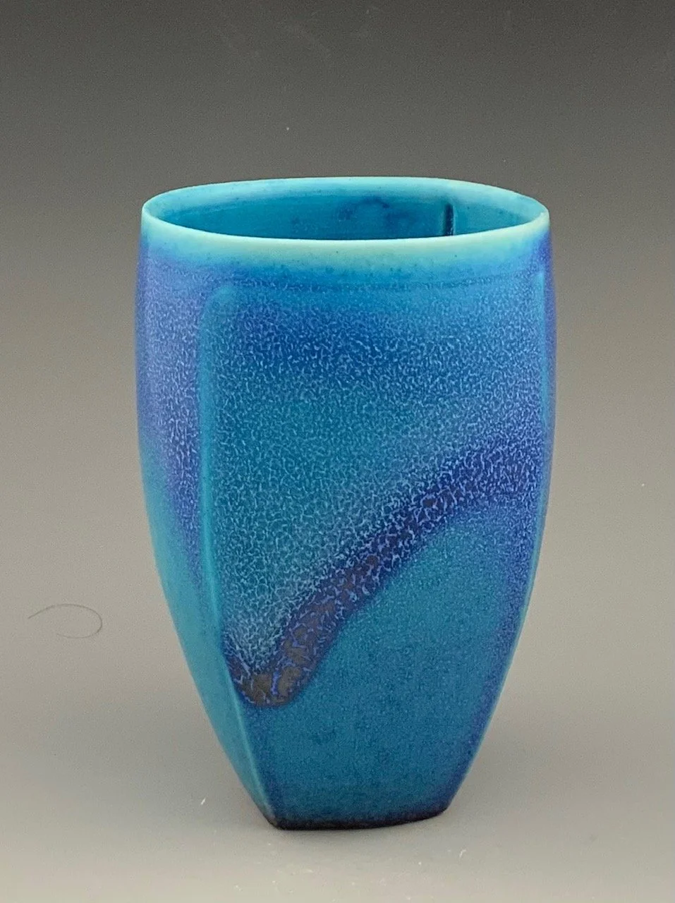 Blue four sided vase 4.24 " $150.