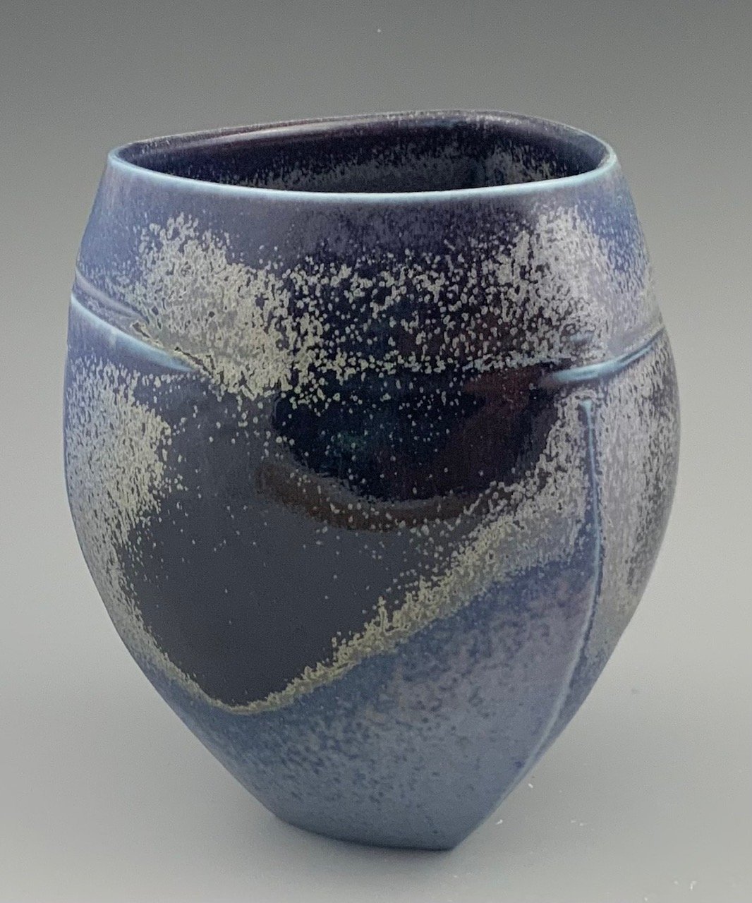 purple 3 sided vase 4" x 3.5" $150.