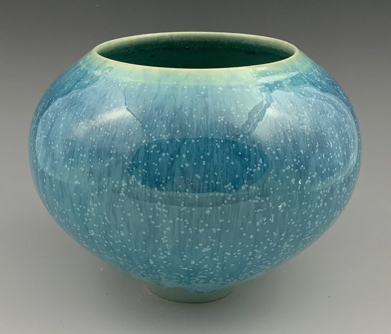 Blueish greenish bulbous 4.75" x 7.5" $300.
