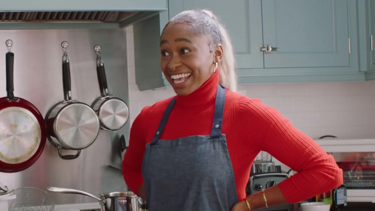 Freddie Ransome smiling in the kitchen, from Tastes Like Homecoming.