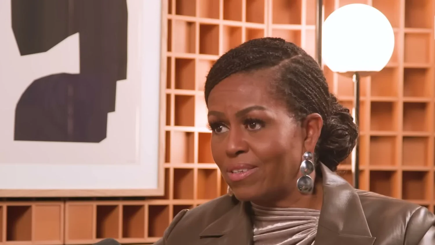 Michelle Obama smiling during her NPR interview.