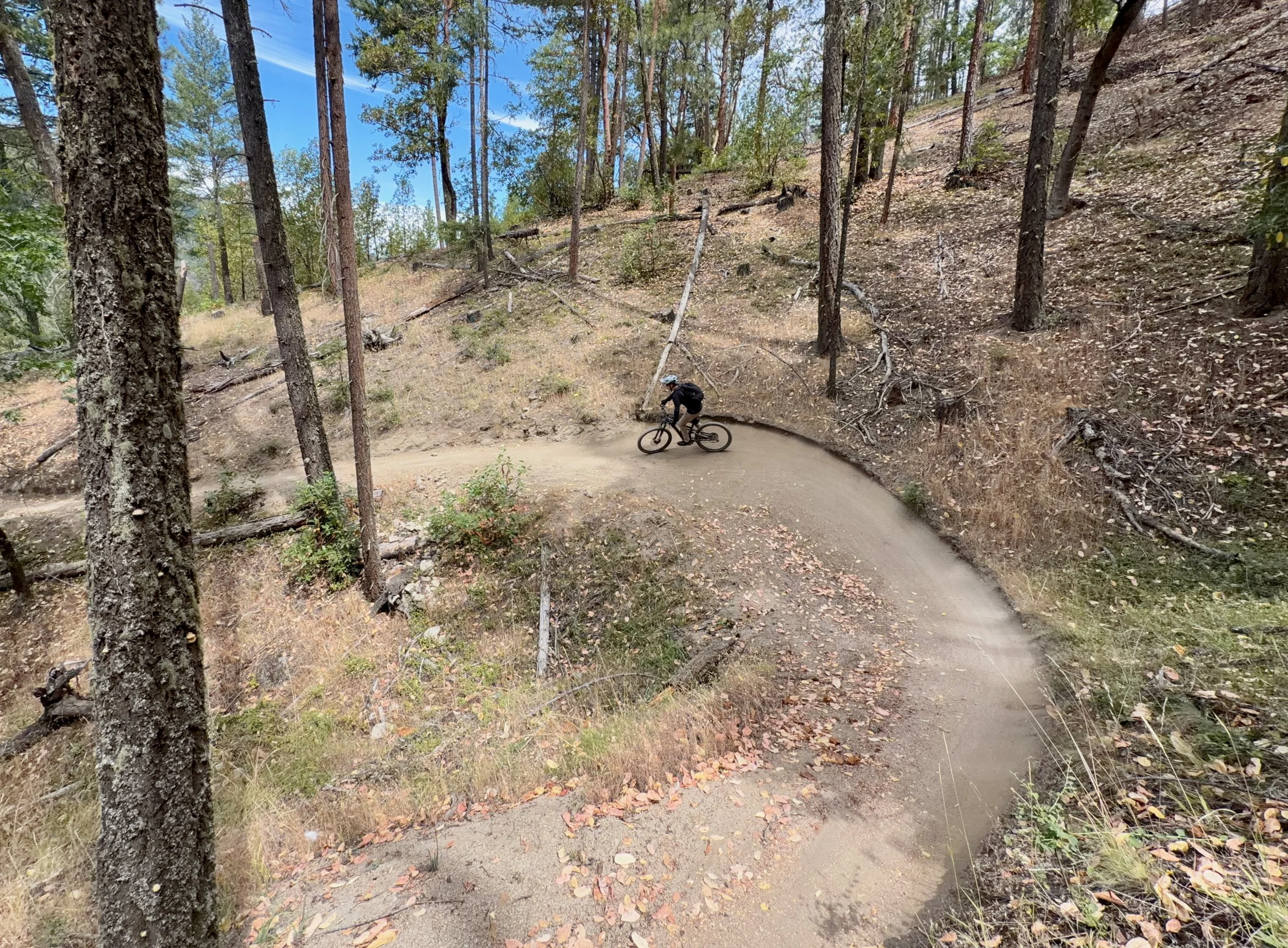 mountain biker riding berm