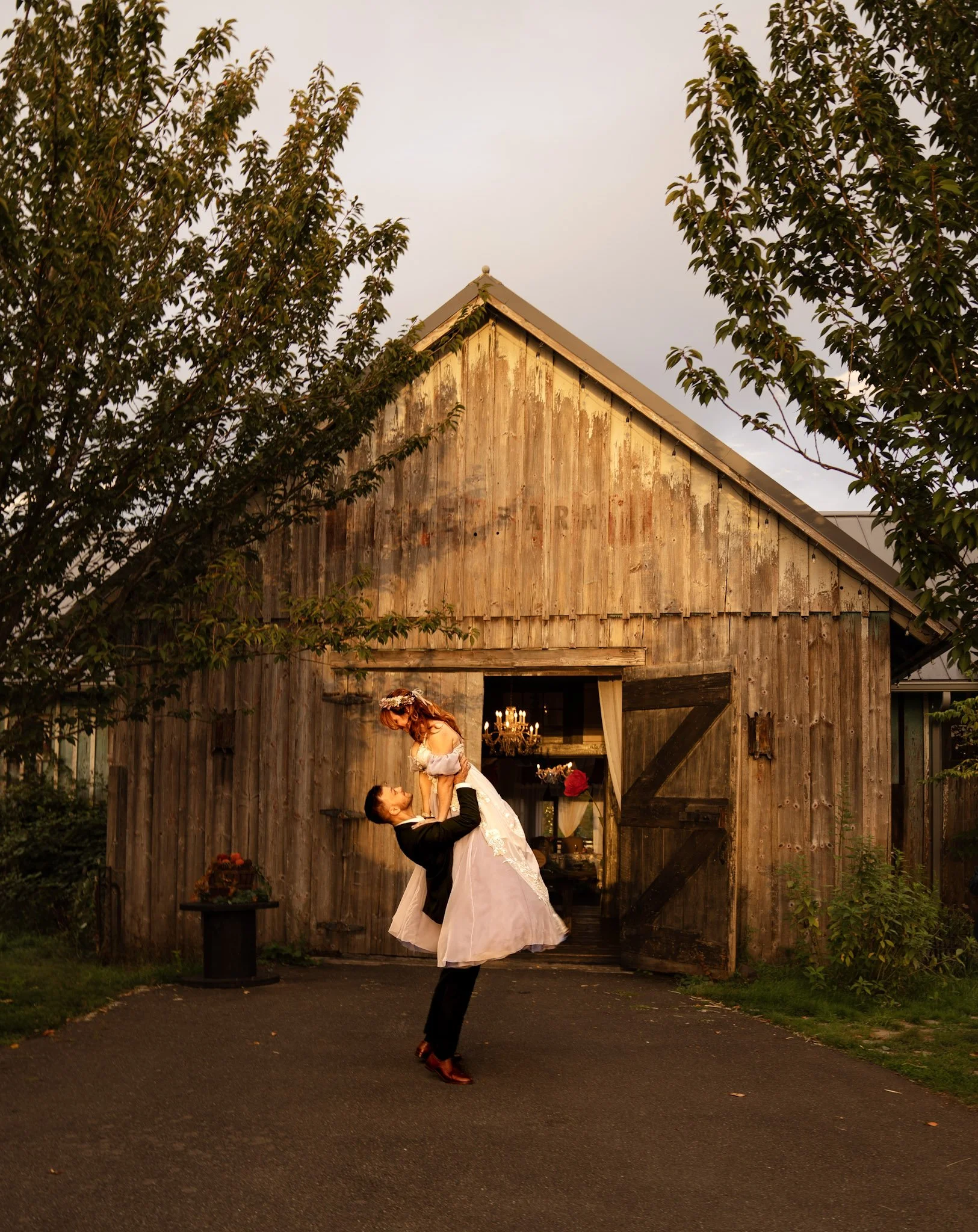 groom lifting bride in the air in Chehalis Washington