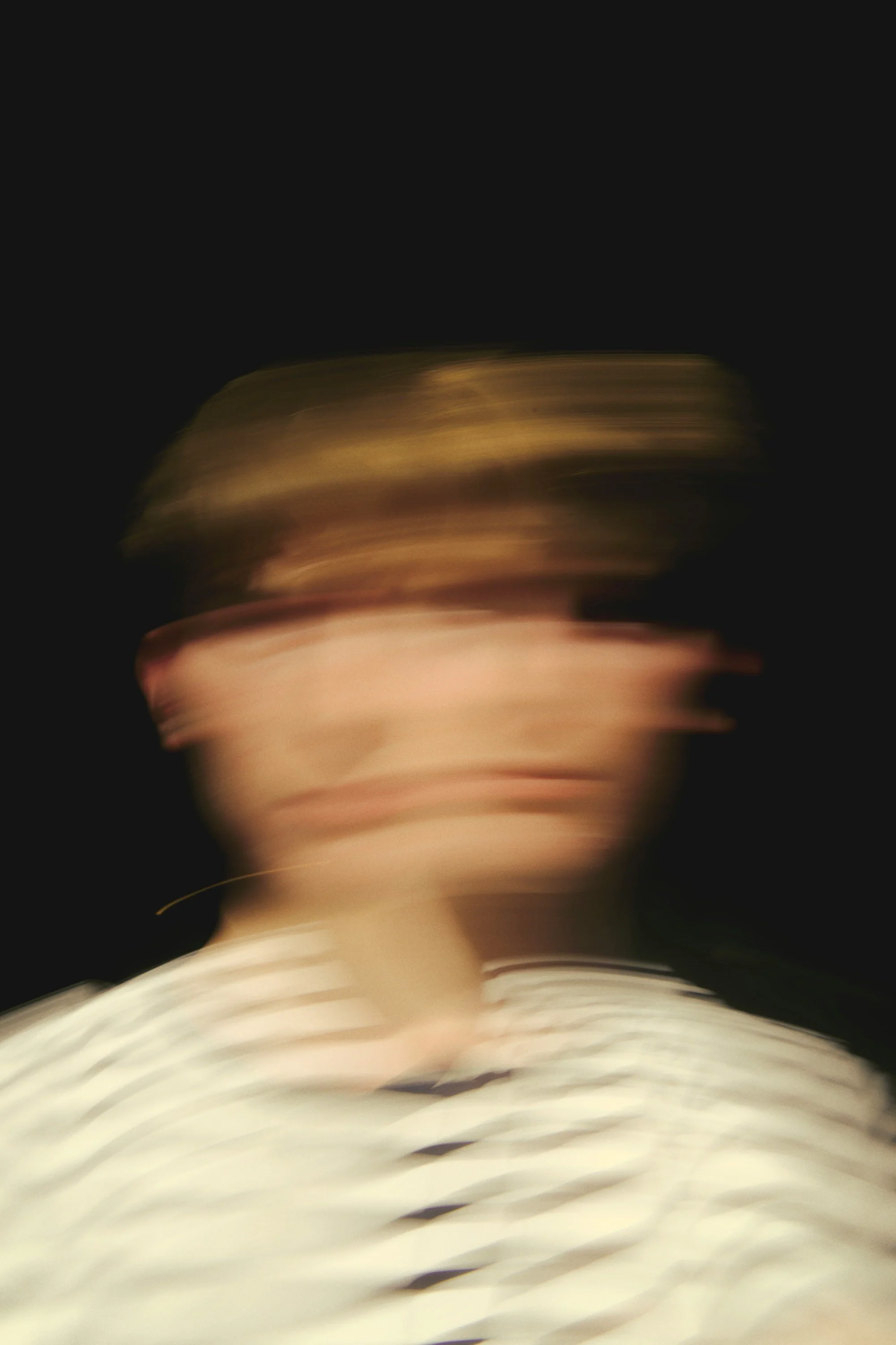 A man shaking his head to symbolize bipolar disorder