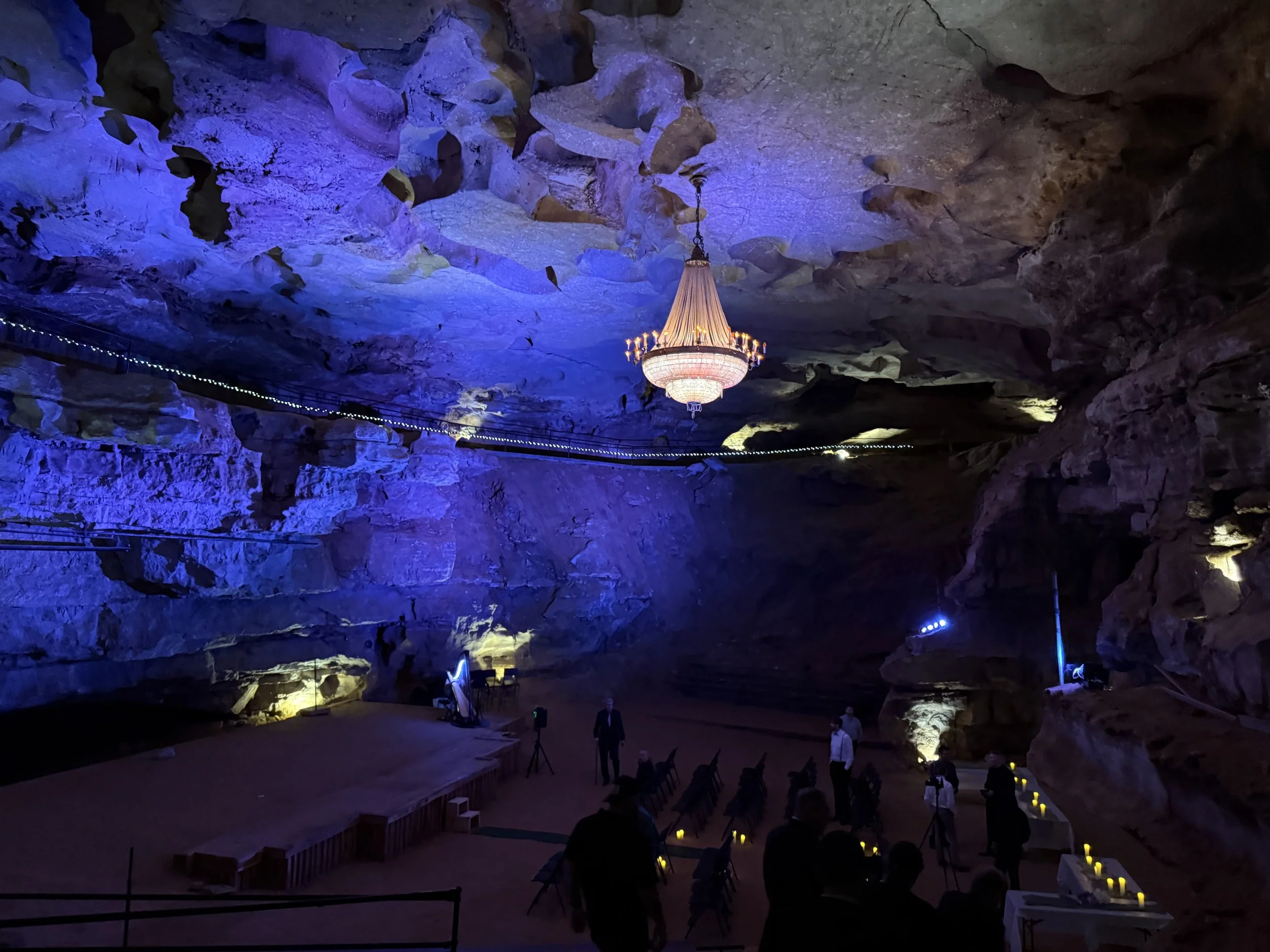Playing for a wedding in a cave- See if you can spot the harp!