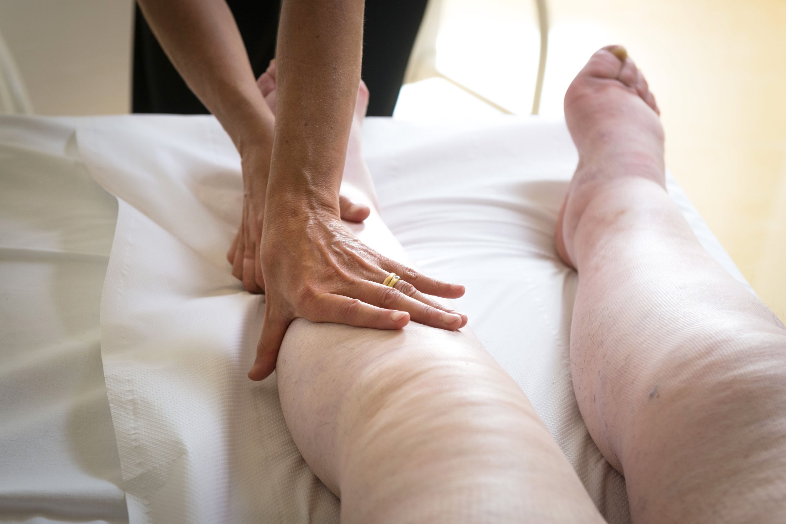 Lymphatic drainage massage for lymphedema, done by a lymphedema therapist.