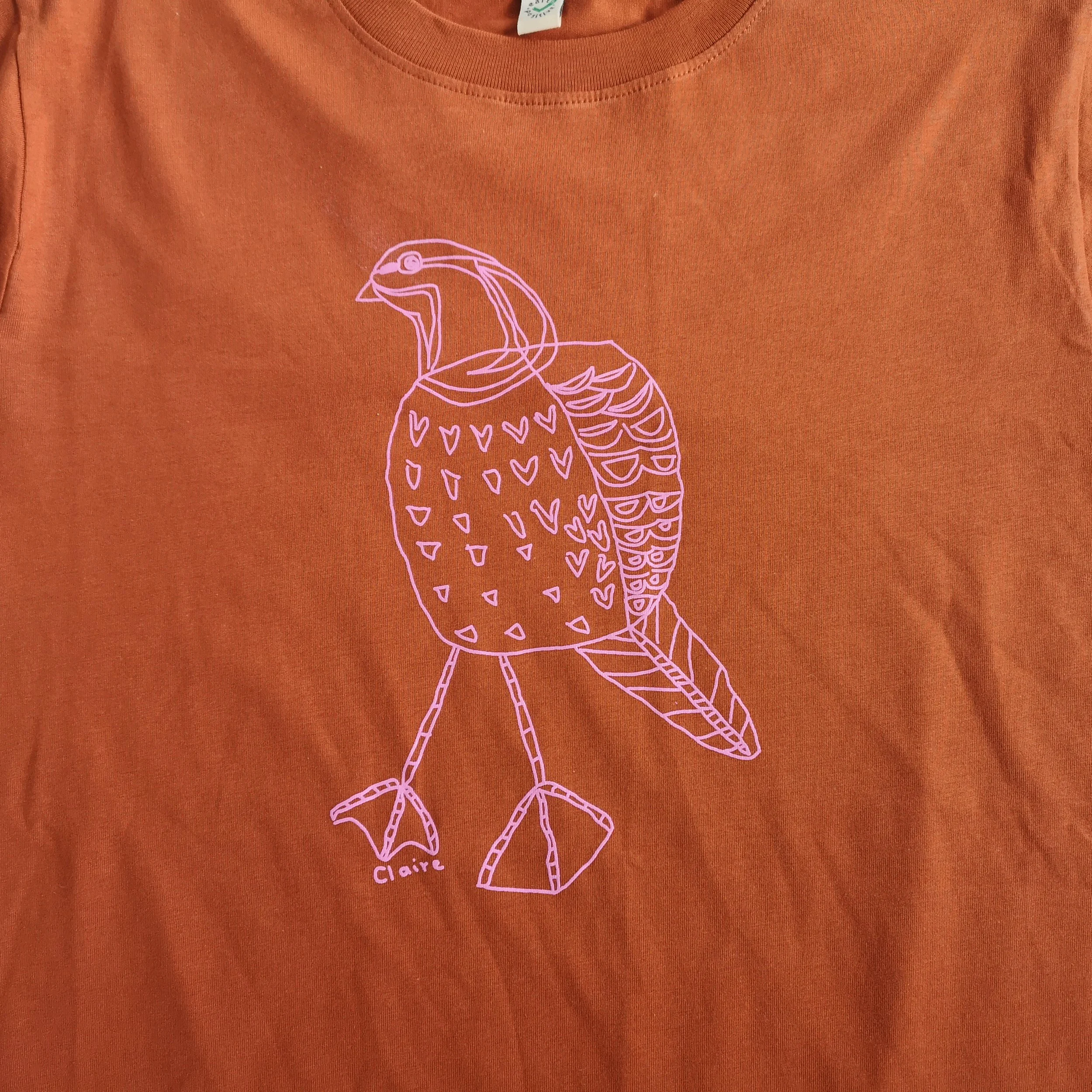 Claire Partridge close up Rust t-shirt.jpg