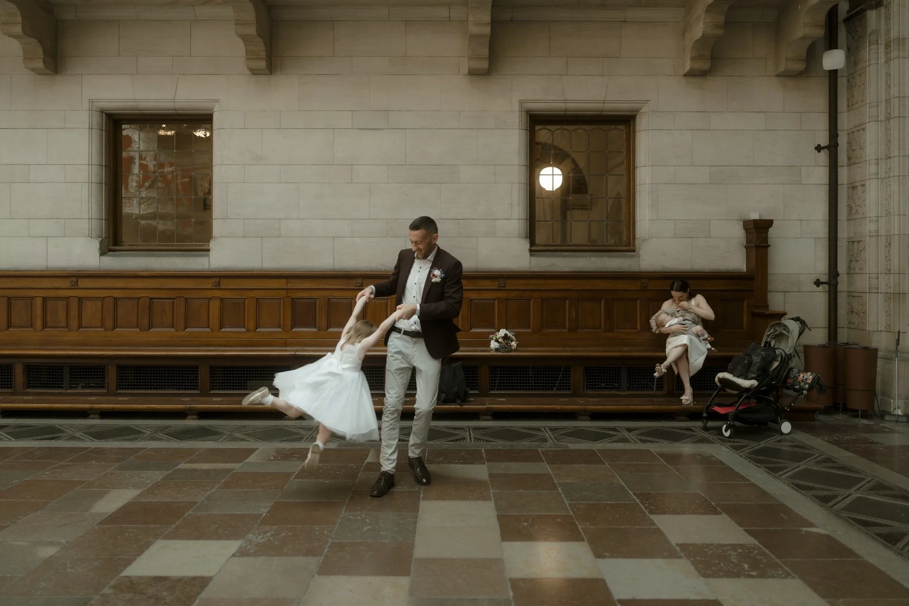 wedding couple nursing and playing with kids in Copenahgen