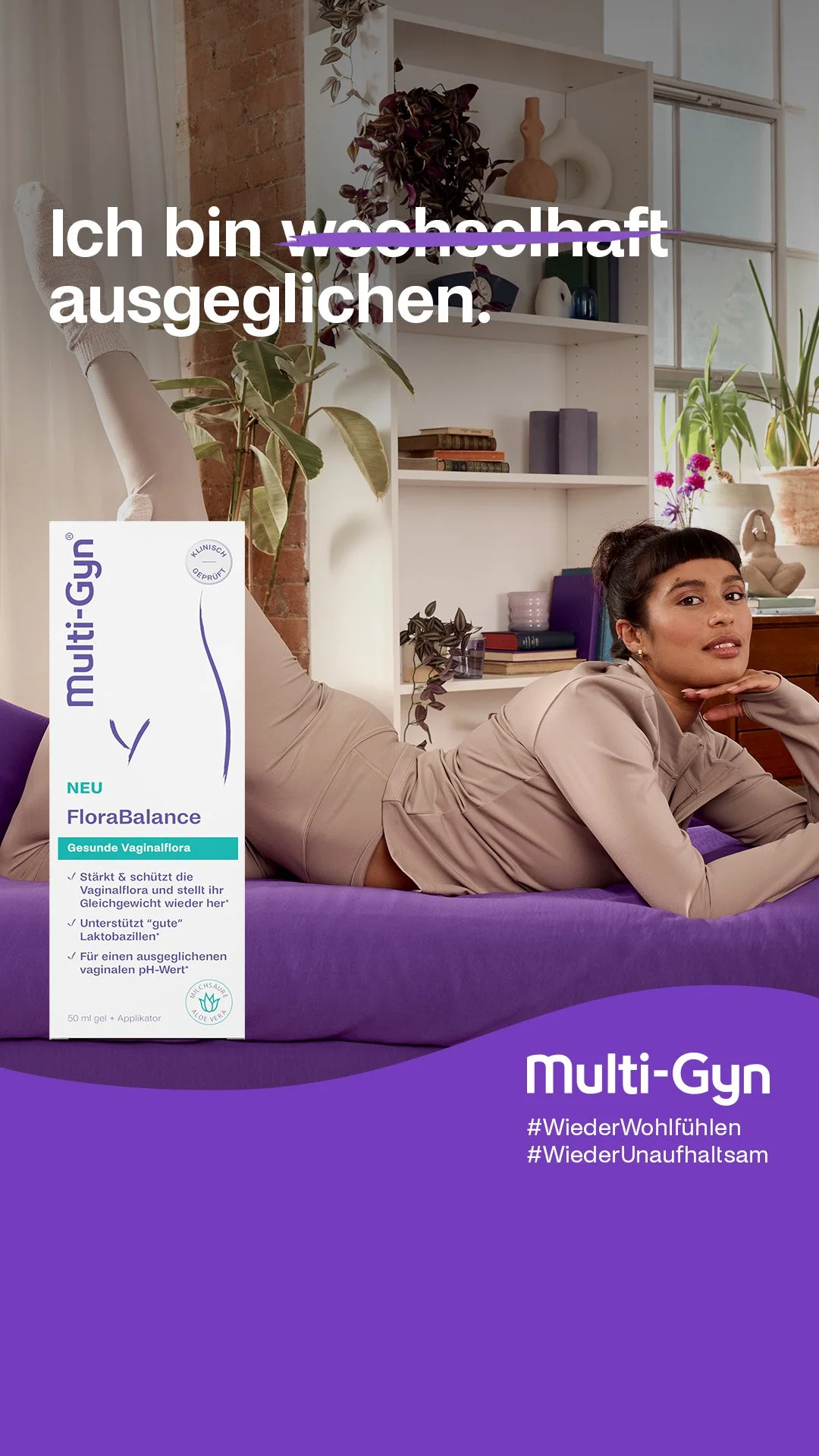 A woman lying on her side on a purple mattress in a cozy room with plants and shelves. Overlaid text in German states "Ich bin ausgeglichen," with a product image of Multi-Gyn FloraBalance vaginal gel and hashtags #WiederWohlfühlen and #WiederUnausge