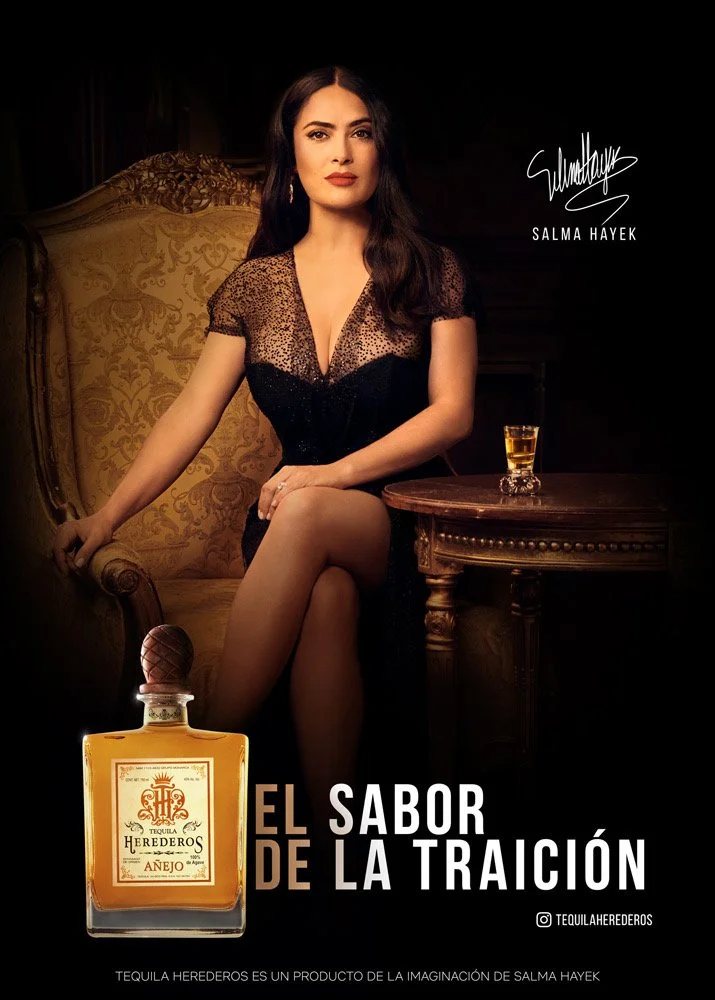 Promotional poster for Tequila Herederos featuring a woman with dark hair in a black dress, sitting on an antique armchair, with a bottle of tequila and a glass of tequila on a wooden table. The poster includes the text "El Sabor de la Traición" and 