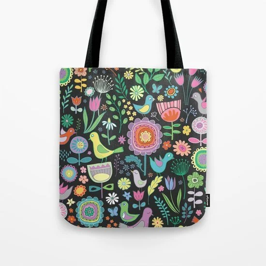 birds-blooms-pastels-on-black-bags.jpg