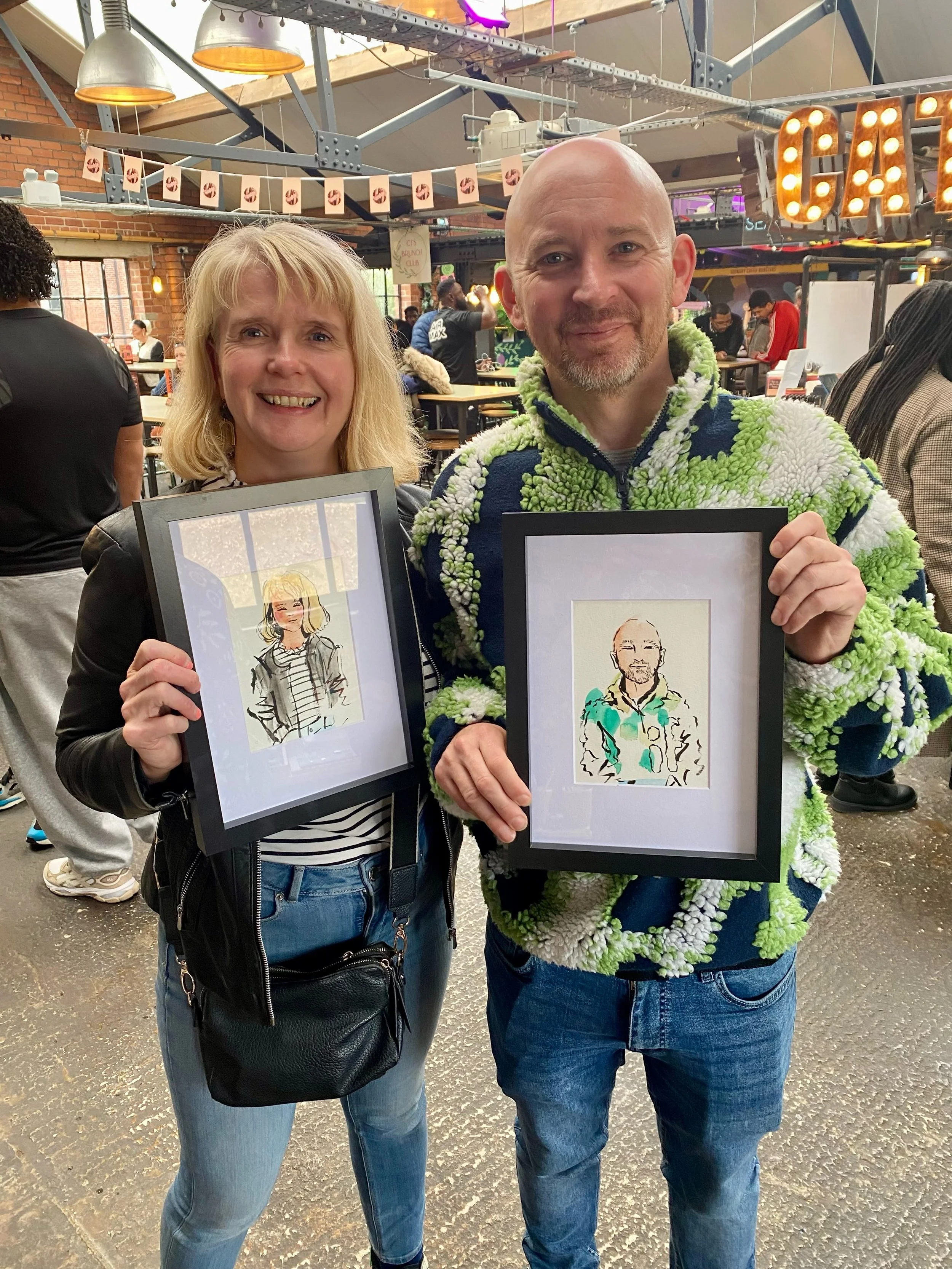 Meet Adam and Lucy! I had the pleasure of painting these two yesterday at the @blackownedsheffield Market at @cutleryworks in Sheffield, and their portraits are now framed and ready to hang.

And the all-important final approval? Their cat, Stinker, 