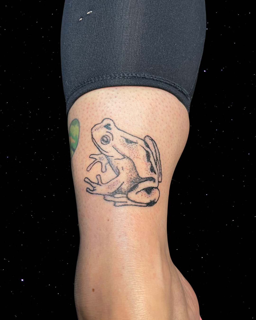 Hand Poked Tattoo of a Frog on an Ankle