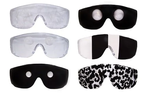 Six pairs of sleep mask glasses in various colors and patterns, including clear, black with white lenses, black and white animal print, and black with holes.