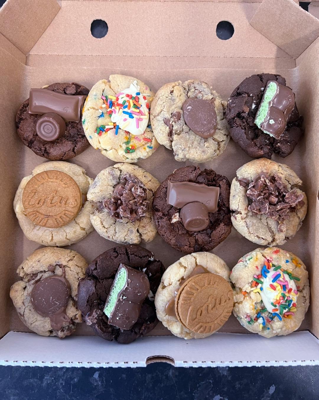 Mixed mini cookie box!! I made two of these mixed boxes for a customer to gift to friends at work and uni! I had so much fun raiding my chocolate stash choosing the toppings. All the bases are either white chocolate chunk, milk chocolate chunk or tri