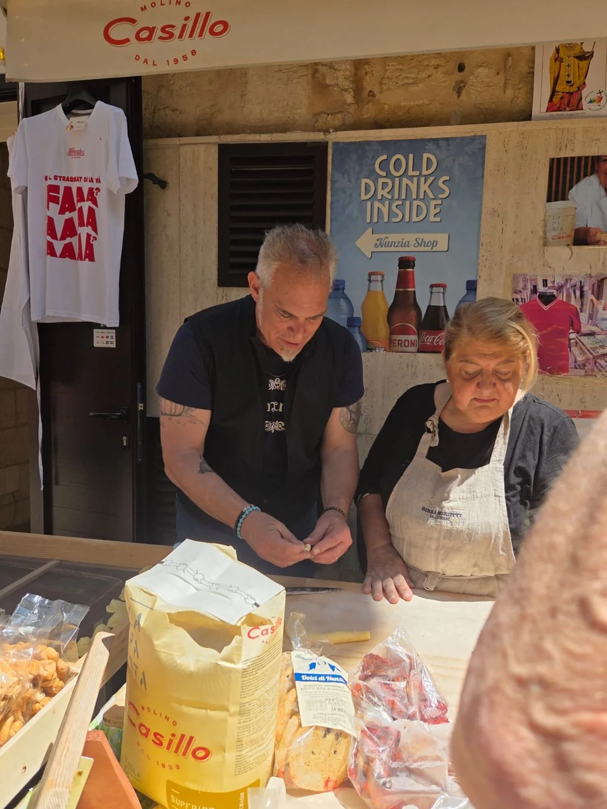 Making Orecchiette (pronounced o-rek-kyet-teh) on Arco Basso Street in Bari