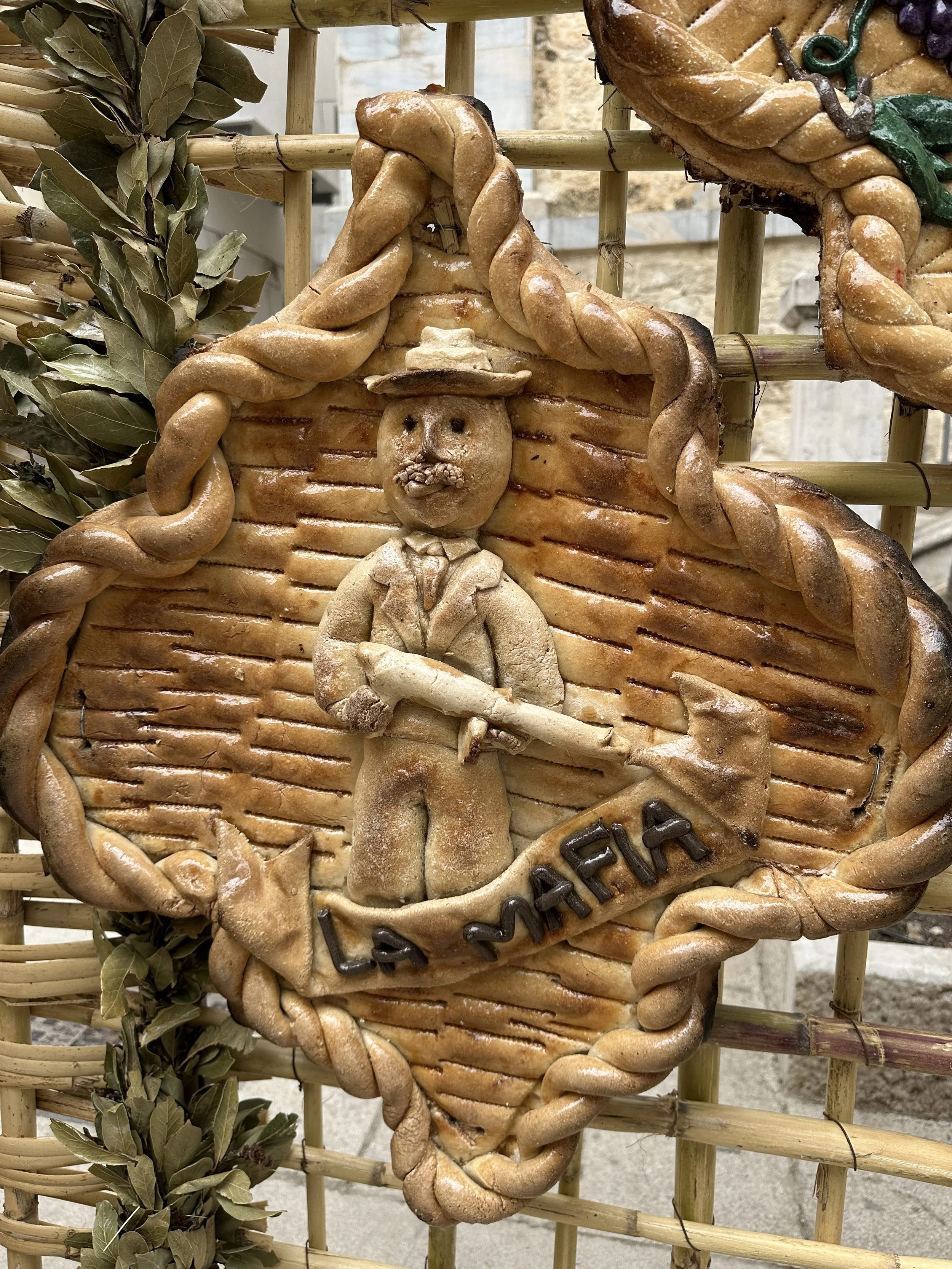 Mafia depicted in the Bread Art Festival - San Biagio Platini