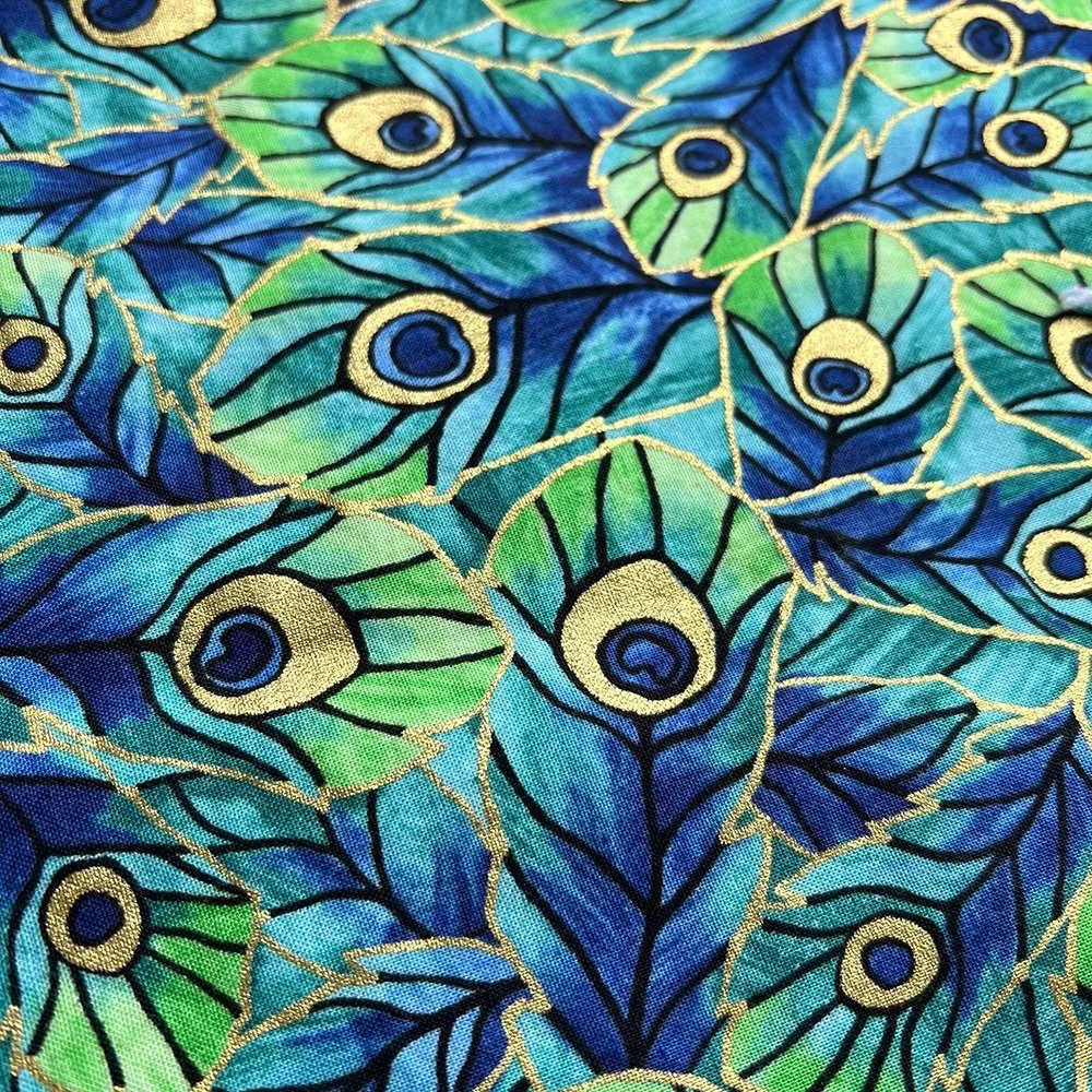 xitrous_napkins_golden+peacock+feathers.jpg