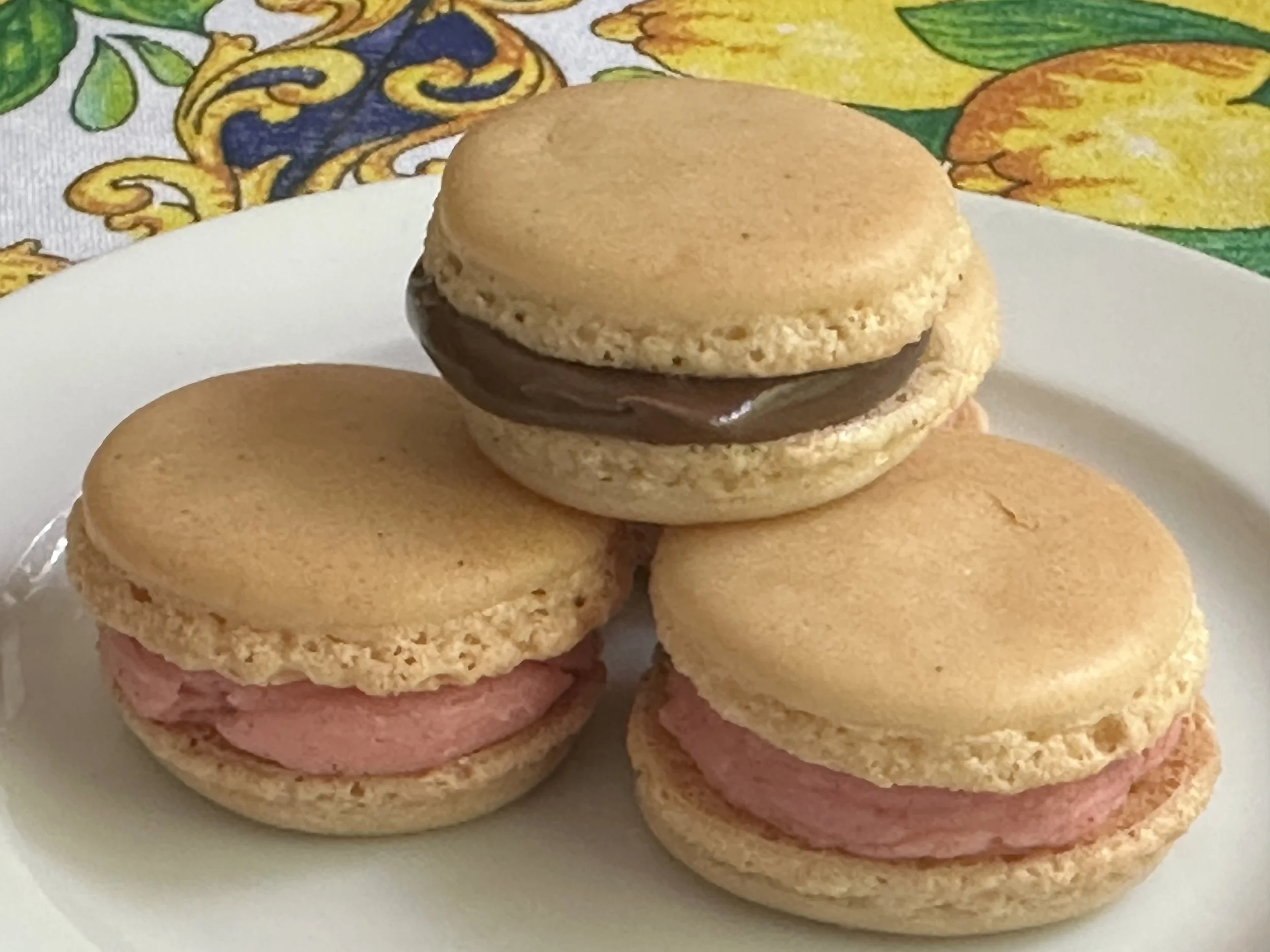 Vanilla French Macarons with Nutella and Strawberry Buttercream filling