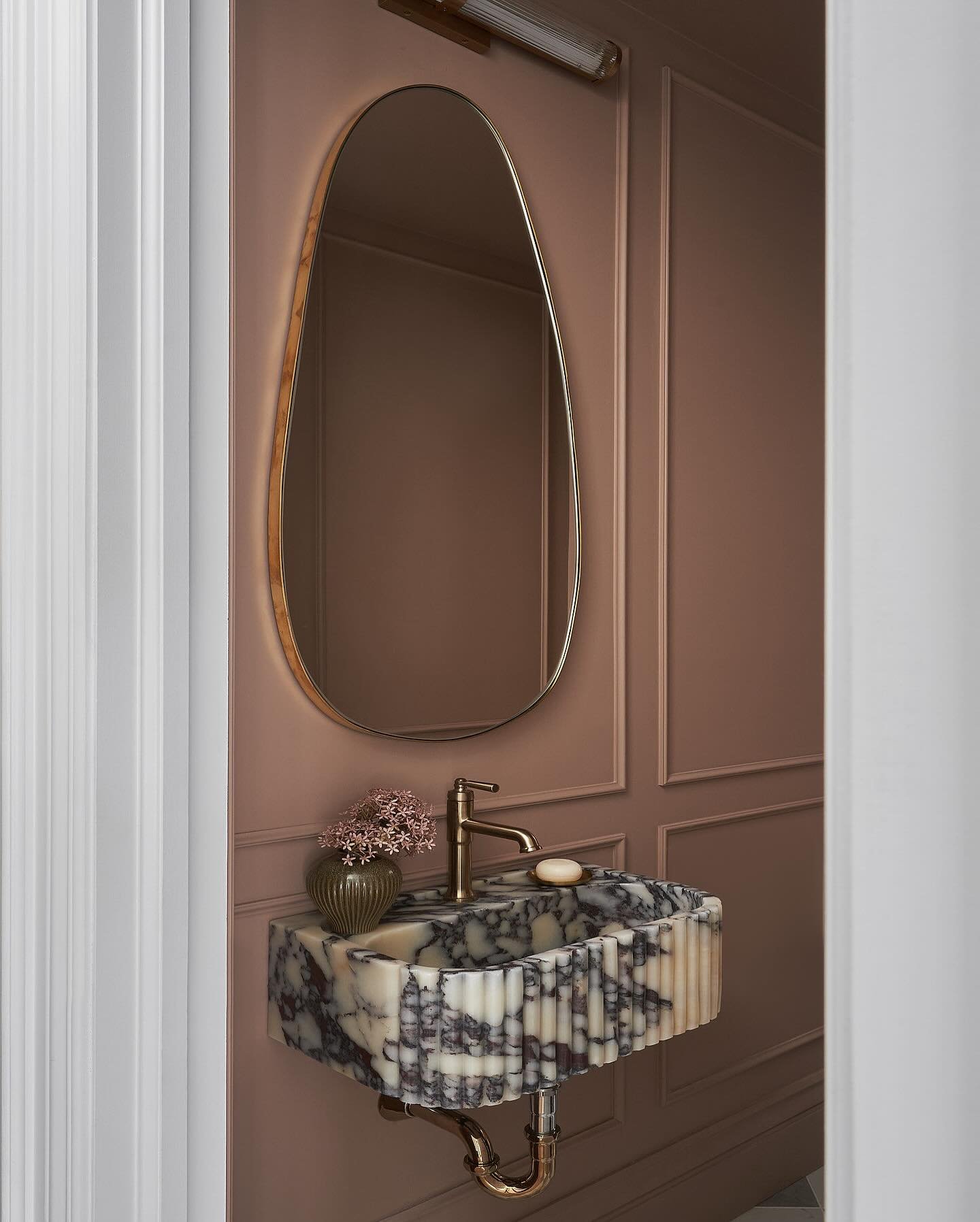 It&rsquo;s been a year since we completed this project and this powder room still gets me! ❤️

This was previously a small and awkward entrance foyer. By relocating the front entrance door, we were able to carve out the perfect little space for this 