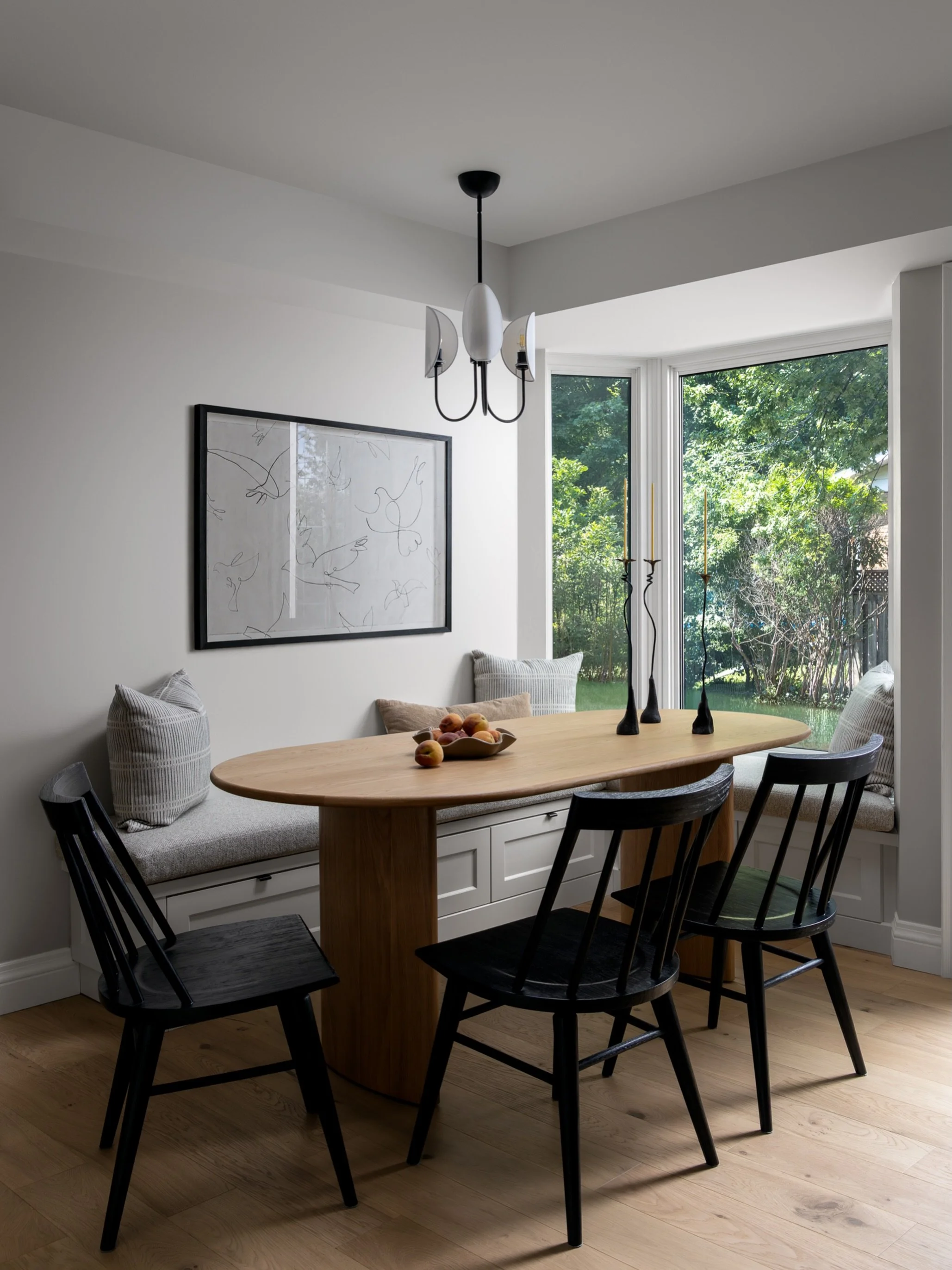 An underused corner, transformed into a comfortable gathering space. This bespoke banquette was designed to fit perfectly within the existing bay window, with built-in storage beneath.

Design: @studio.moffatt 
Construction: @slingerconstruction 
Pho