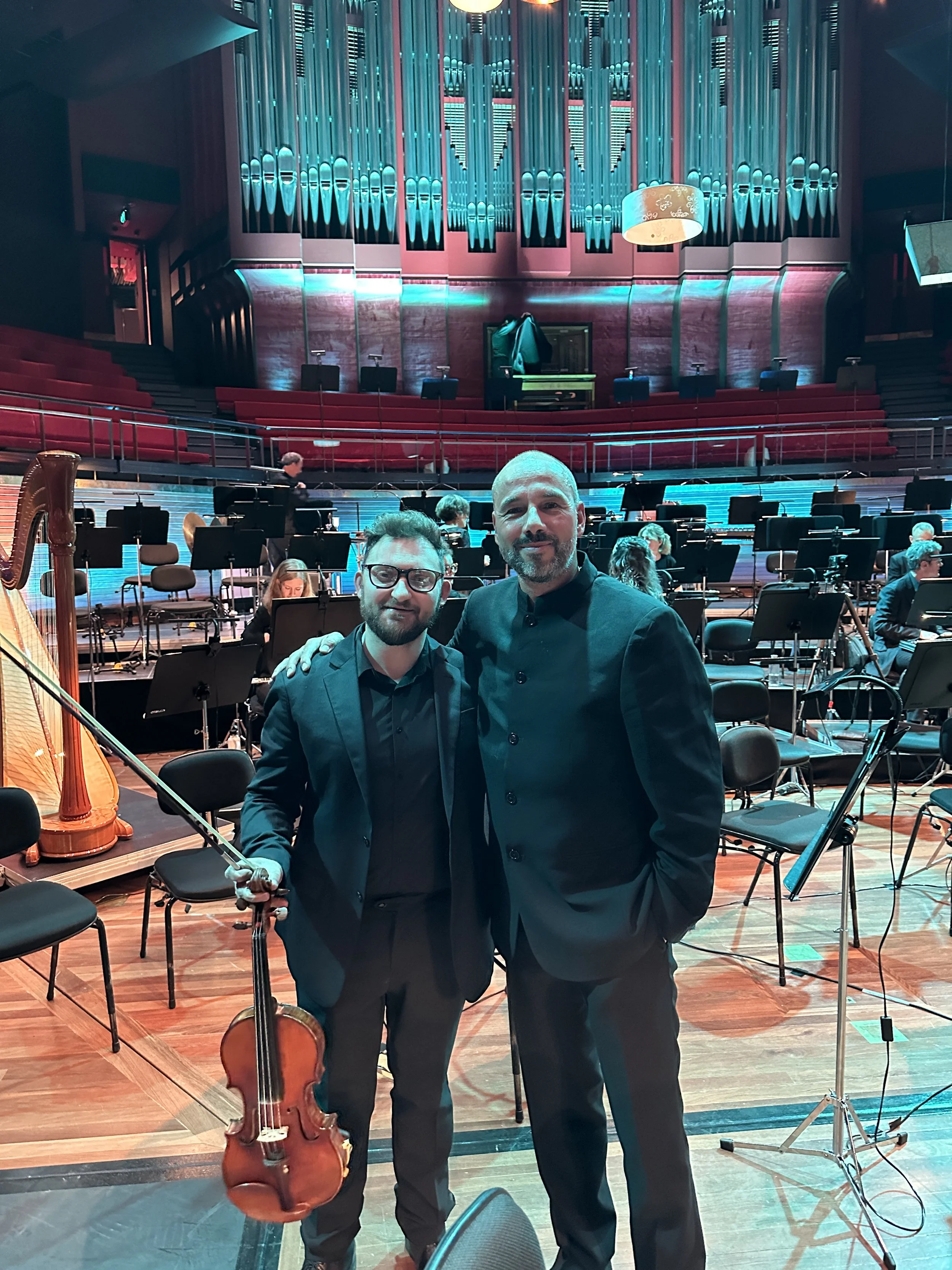 William Shaub with conductor Lawrence Renes, after serving as Guest Concertmaster of the New Zealand Symphony Orchestra on tour at Christchurch Town Hall.