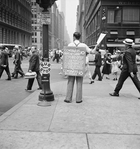 dorothealange-dorothea-lange_street-hawker-selling-consumers-bureau-guide-42nd-street-and-madison-avenue-new-york-city-new-york-usa_1939-1417x1500.jpg