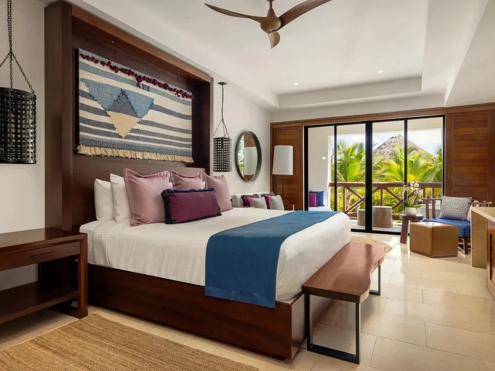 Junior Suite Tropical King Bed - Dianne Manto.jpg