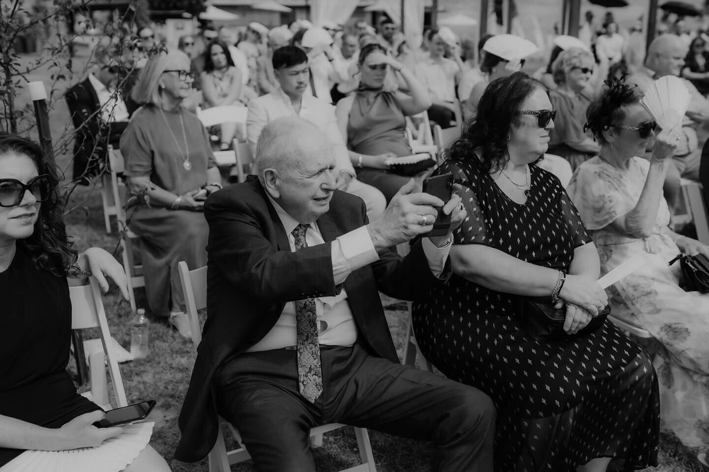 Grandpa snapping that perfect new wallpaper for his iPhone. 👌 
.
.
.
.
.
.
#unpluggedwedding #weddingphotographer #orangenswweddings #momentofamoment #centralwestweddings