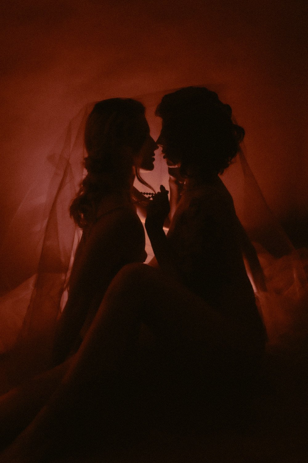 A photo of NYC Kinky Redhead Escort Julia Flowerbomb and a female companion.