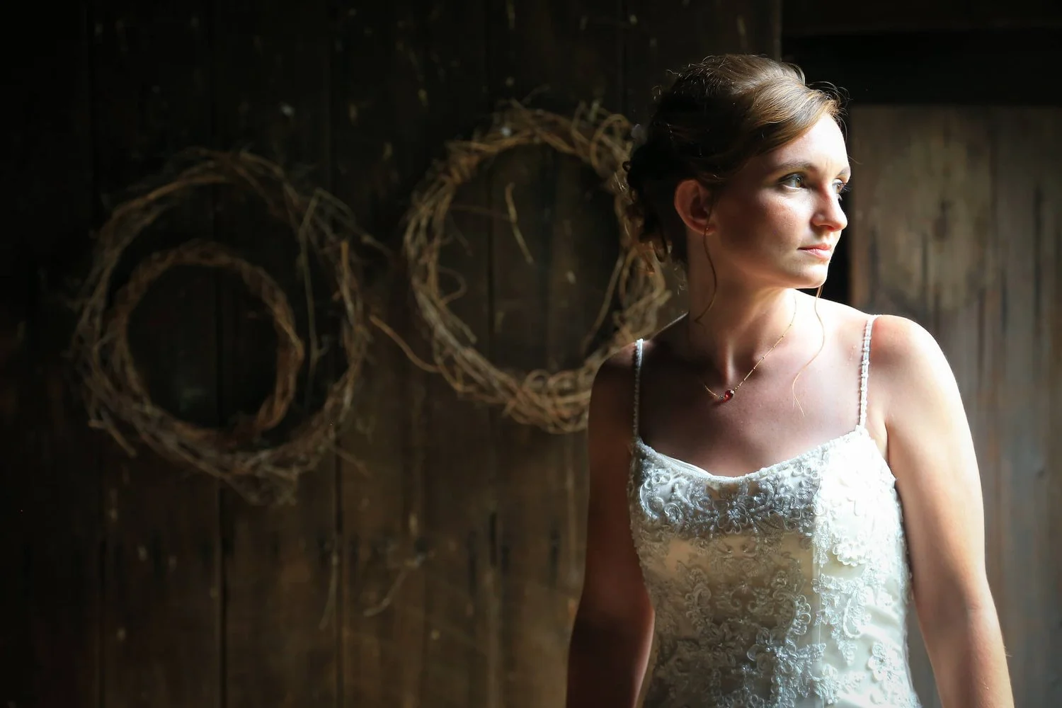 Bridal Portrait against barn wall with lighting | Whysall Photography