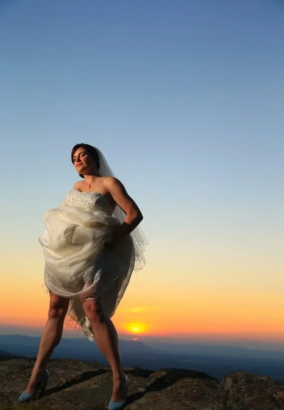 Magazine style bridal portrait Blue Mountain lodge at sunset