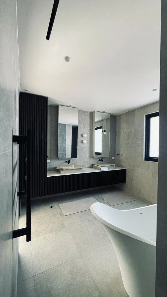 Bathroom black panel.jpg