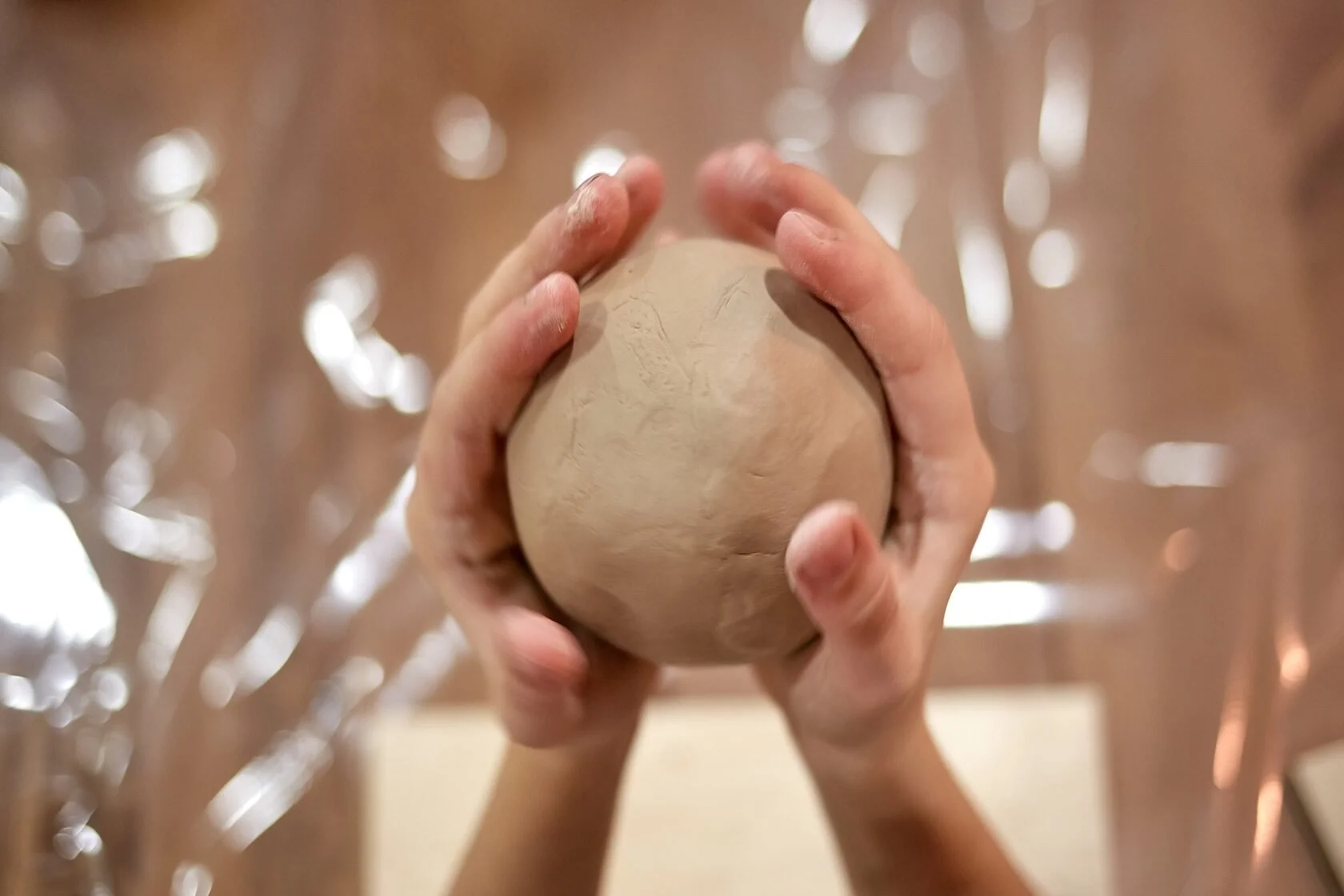 What type of clay is used in pottery workshops?