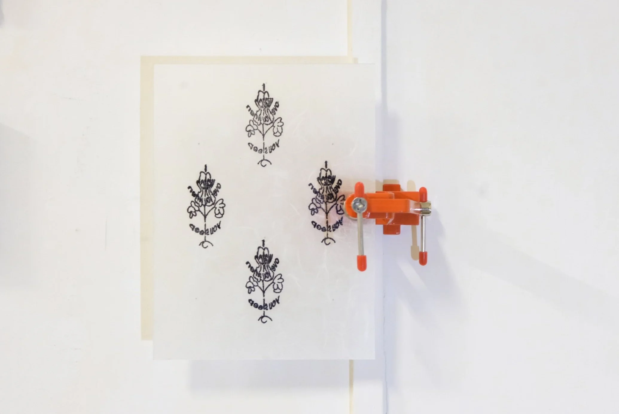 "LullaBYE"
Plexiglass with stamped semi-transparent paper fixed by a vise 
25 x 35 cm
2025