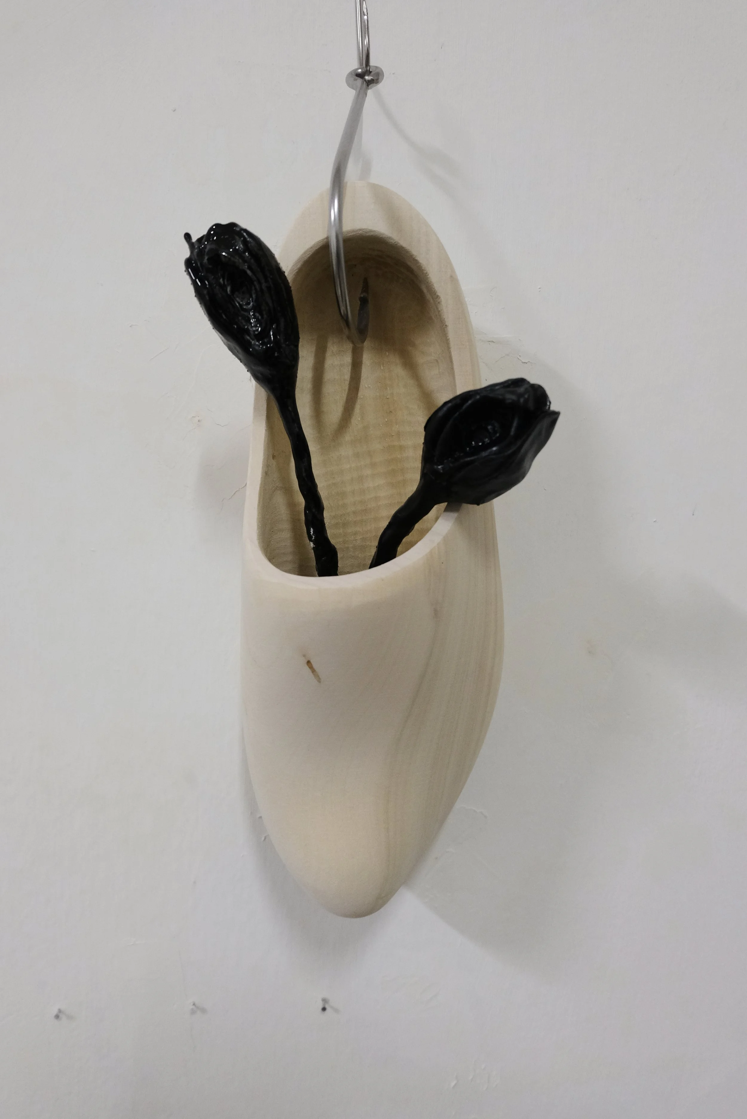 "Papa"
Clay, epoxy and wooden shoe 
10 x 35 cm
2025