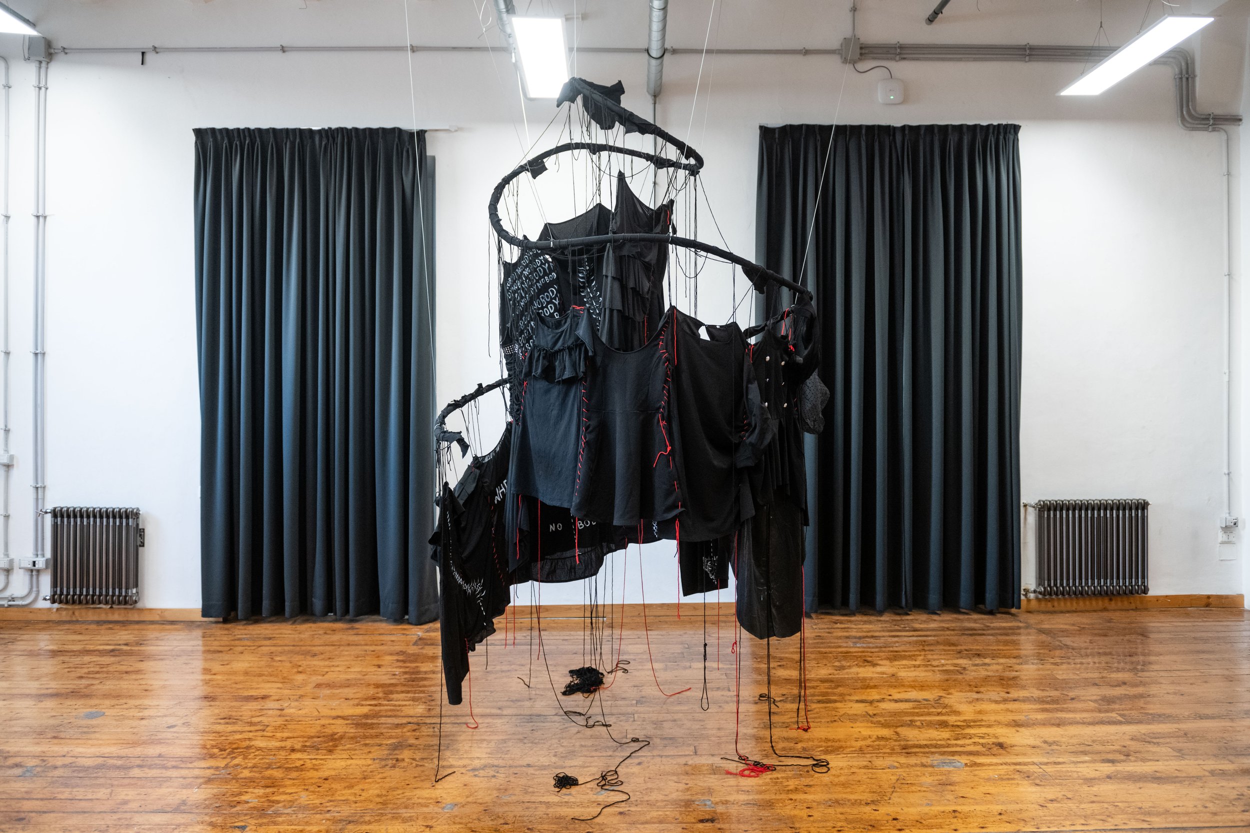 Nathalia Koux
"Dress Without A Body"
Installation with dresses, red thread, acrylic (2024)