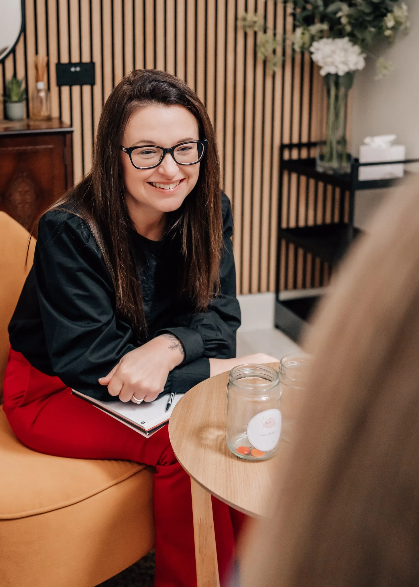corrina beasley smiling with a client
