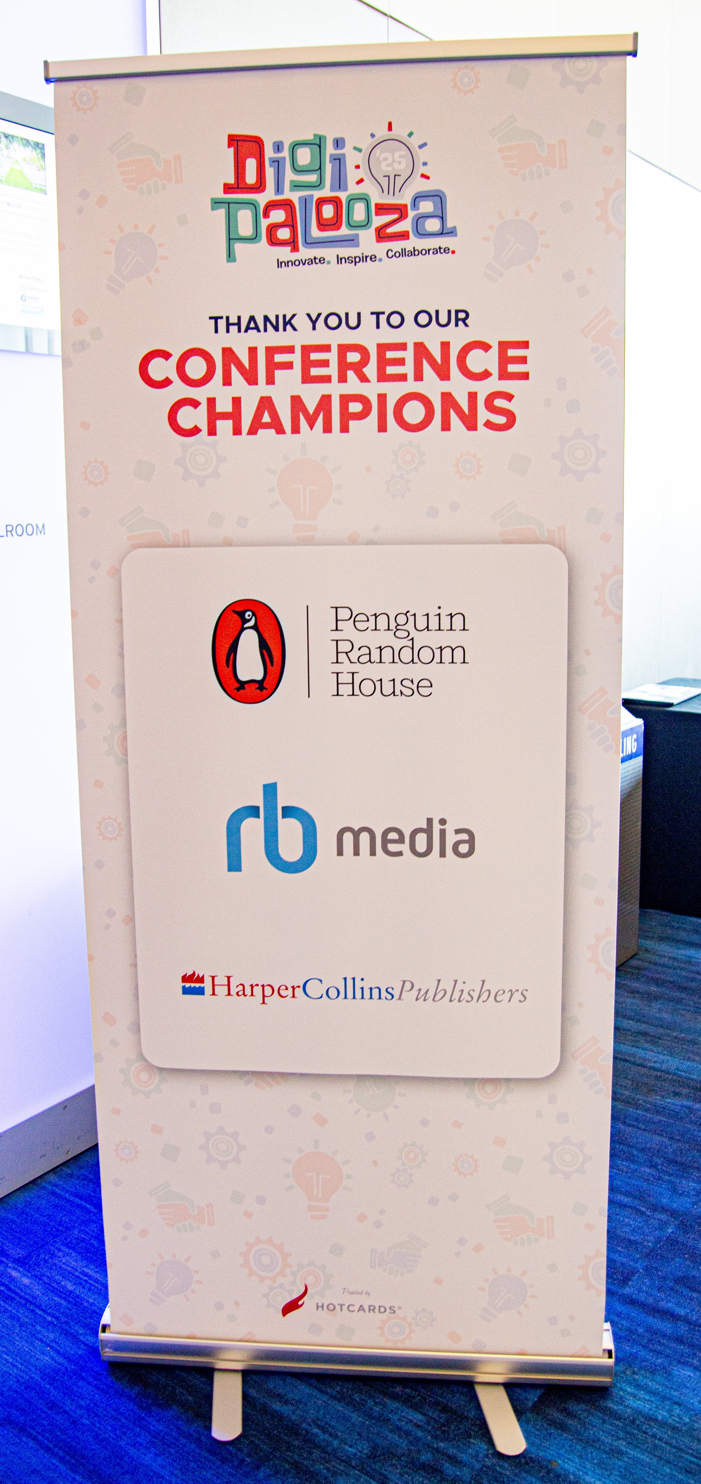 Conference champions roll up banner 