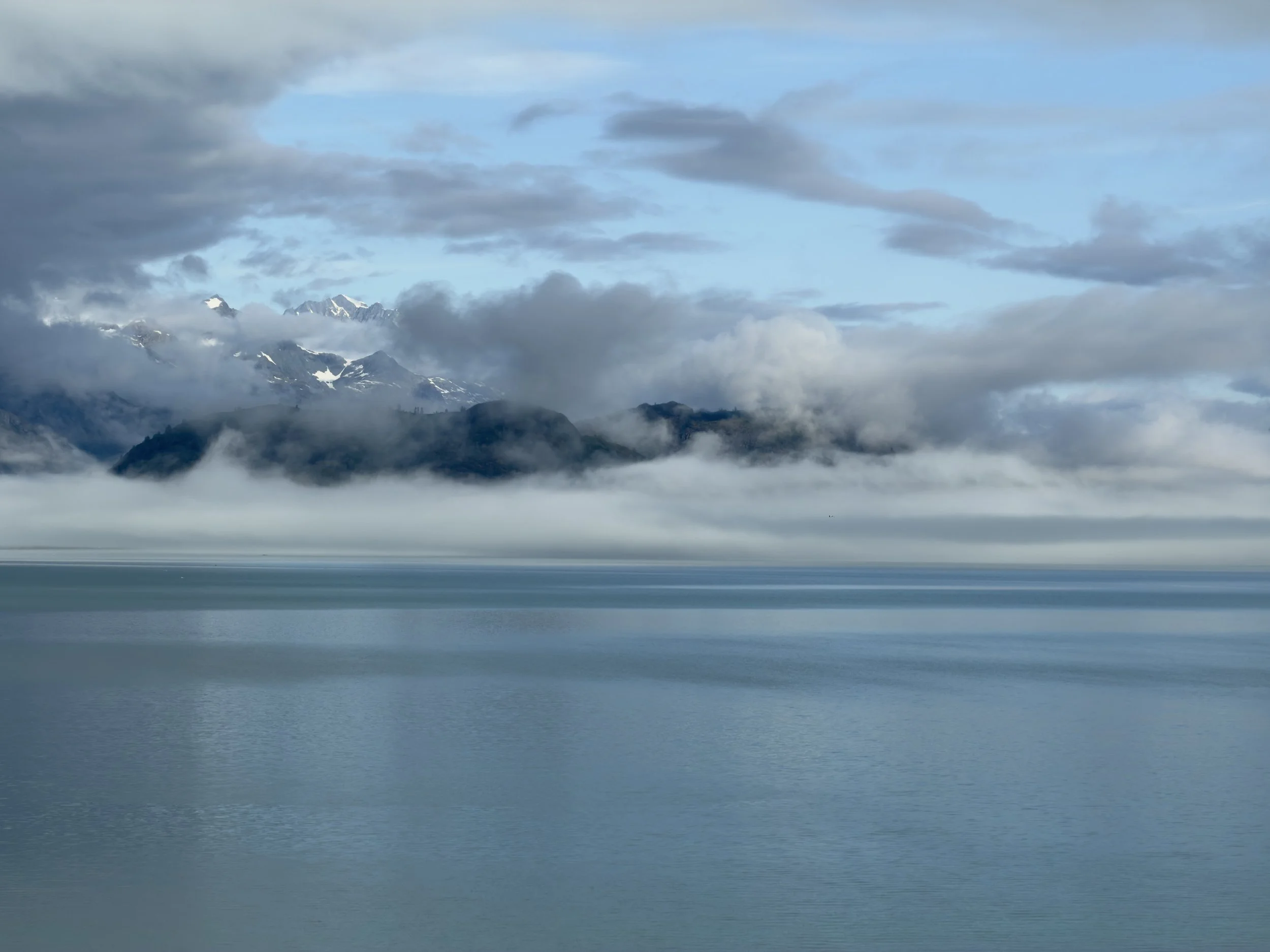  The fog giving way to the first glimpse of Glacier Bay National Park 