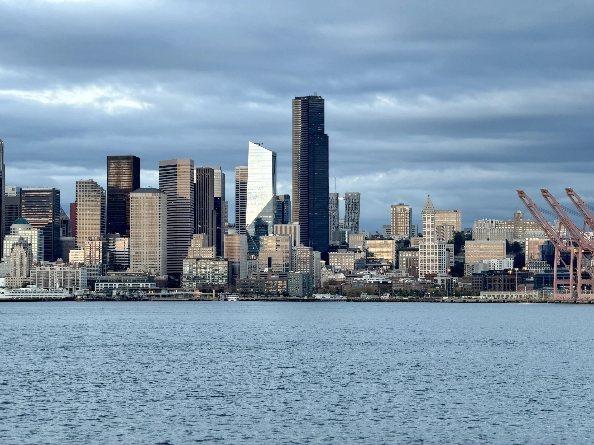  A wider view of sunset on the buildings in the harbor at Seattle, Washington 