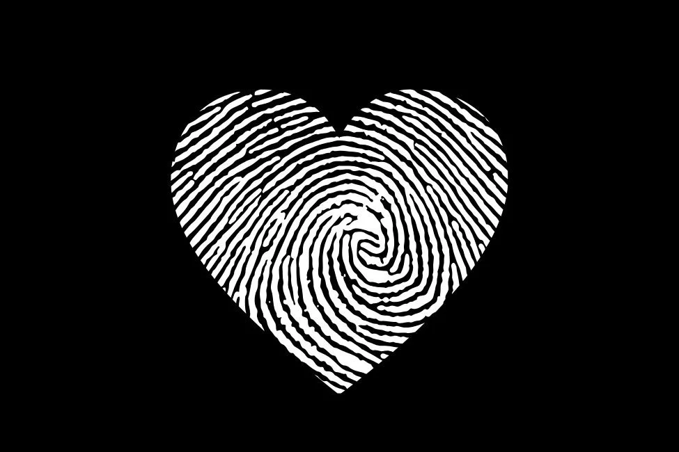 Black background with a white fingerprint shaped like a heart.