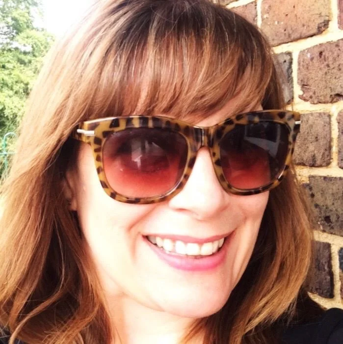 Sam Richardson smiling outdoors, sharing a glimpse of life beyond coaching.