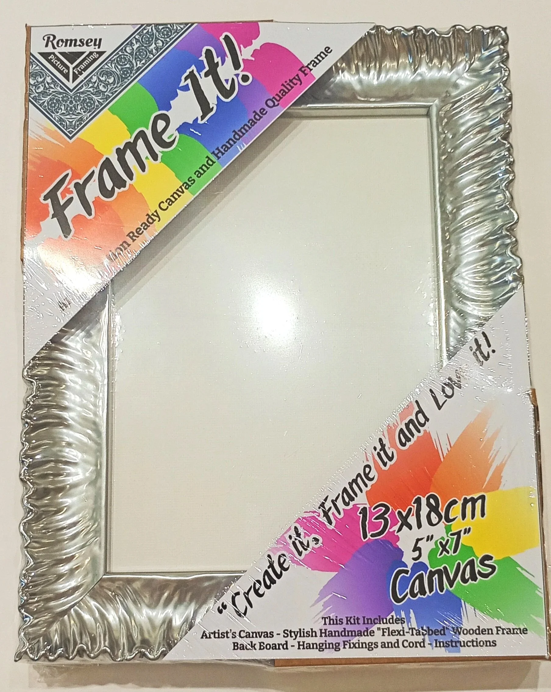 Packaging box for an artist's canvas and wooden frame kit, with colorful rainbow banner and black text detailing contents.