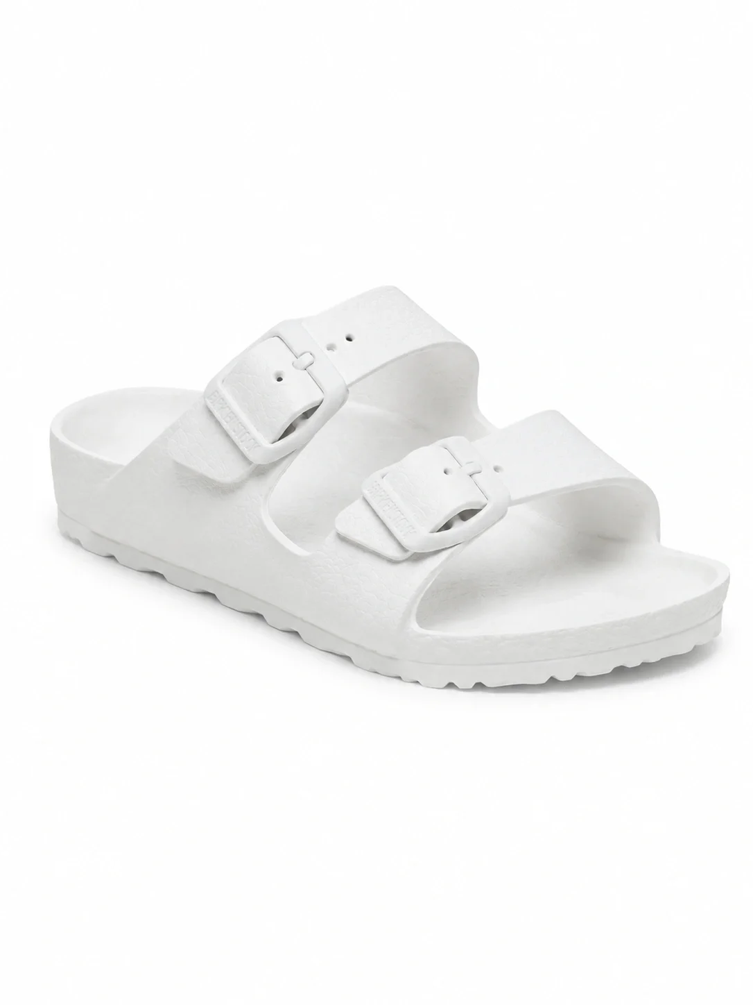 White Birkenstock Arizona EVA sandals featuring tonal buckles and waterproof material