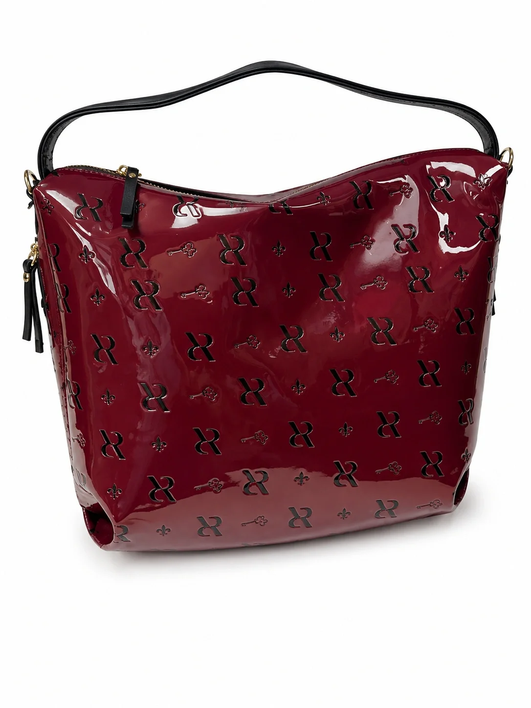 Red patent leather handbag with black handle and black logo and fleur-de-lis pattern, featuring gold hardware and a decorative tassel