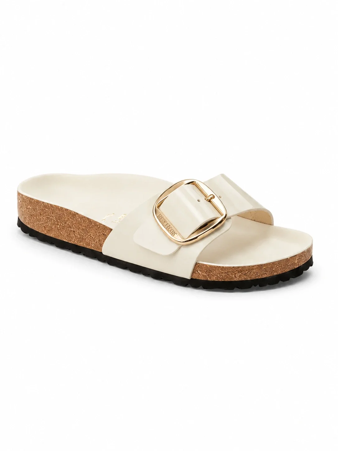 Birkenstock Madrid Big Buckle sandals featuring a cream-colored leather strap and a large gold-tone buckle