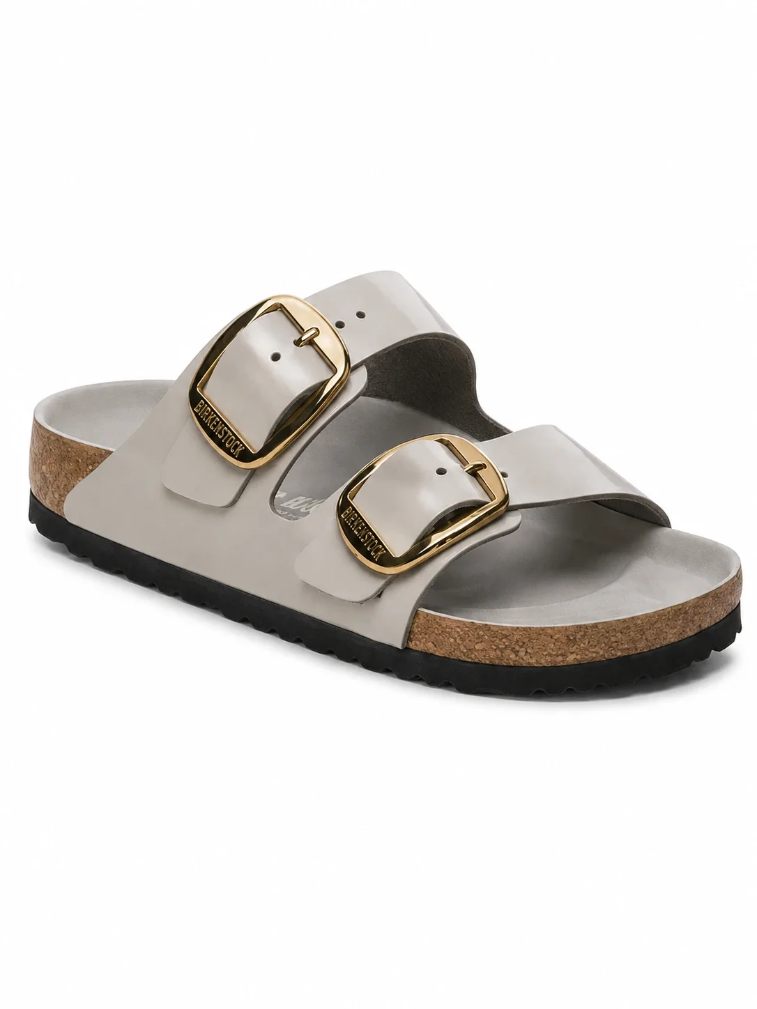 Birkenstock Arizona Big Buckle sandals in a stone coin color, featuring a shiny patent leather finish and large gold buckles