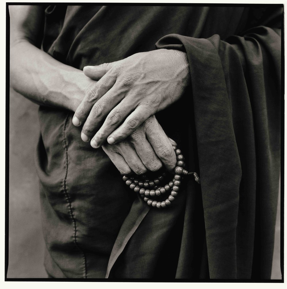 1 Rato Monk holding his rosary
