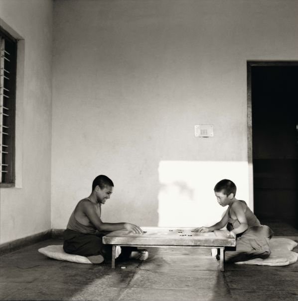3 Two monks playing carrom on a Monday